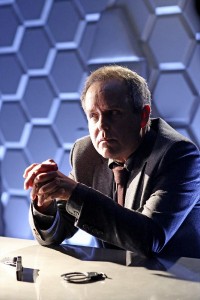 Peter MacNicol portrays Professor Randall who turns out to be an Asgardian warrior.