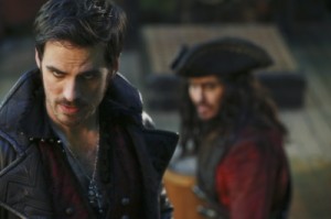 Captain Hook crosses swords with the notorious Black Beard.