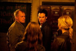 Regretful of his actions, Gene (Stephen Collins) opts to stay behind while his family escapes when Patriots find their hideout