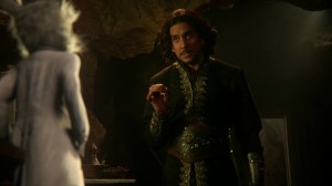 Jafar (Andrew Naveen) strikes a deal with the White Rabbit (John Lithgow) to find another person Alice loves.